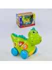 Інтерактивна іграшка Huile Toys Динозаврик 28 х 21 х 18 см Зелений (70008)